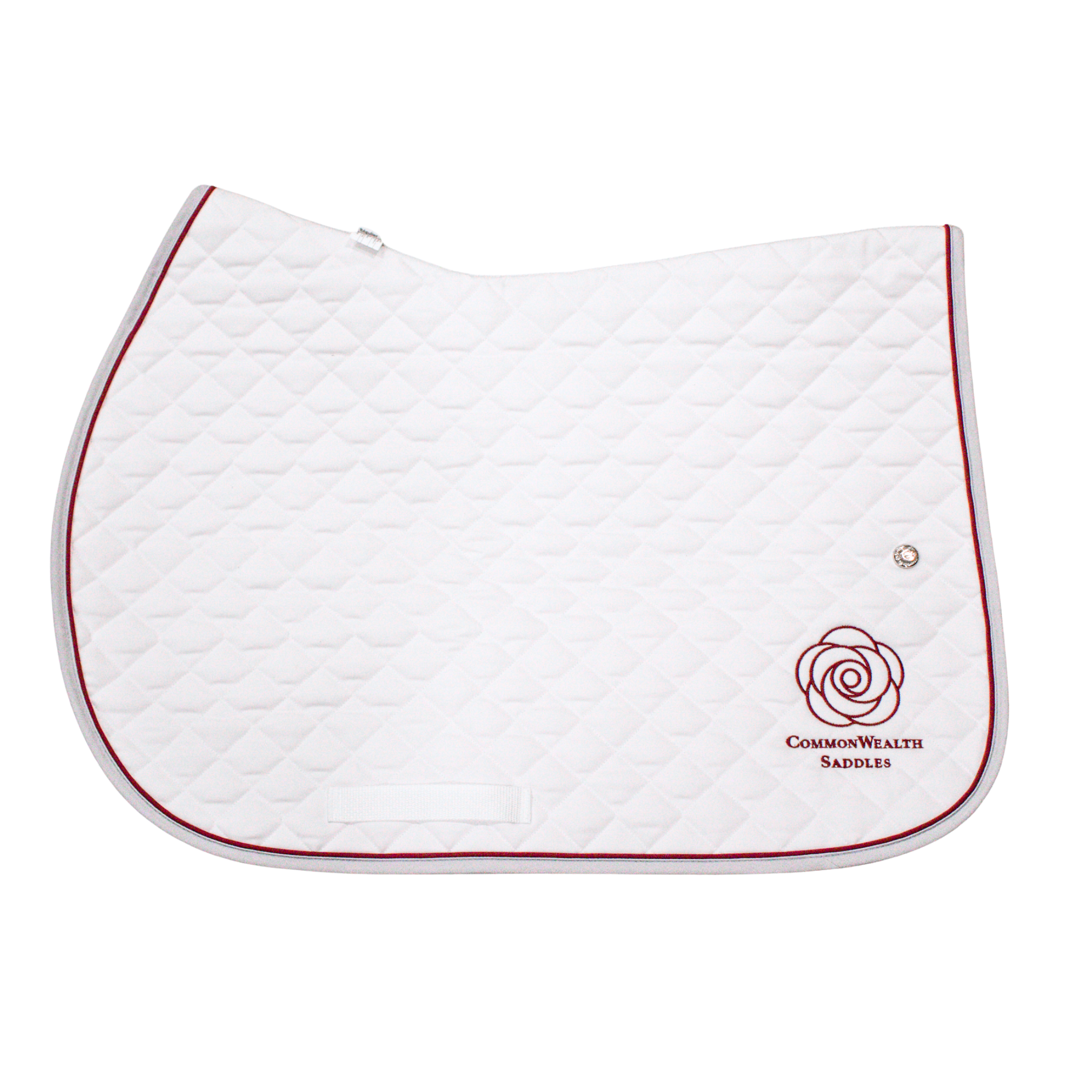 A quilted white Ogilvy saddle pad with grey binding and burgundy piping, and the CommonWealth logo on the back left corner of the pad.