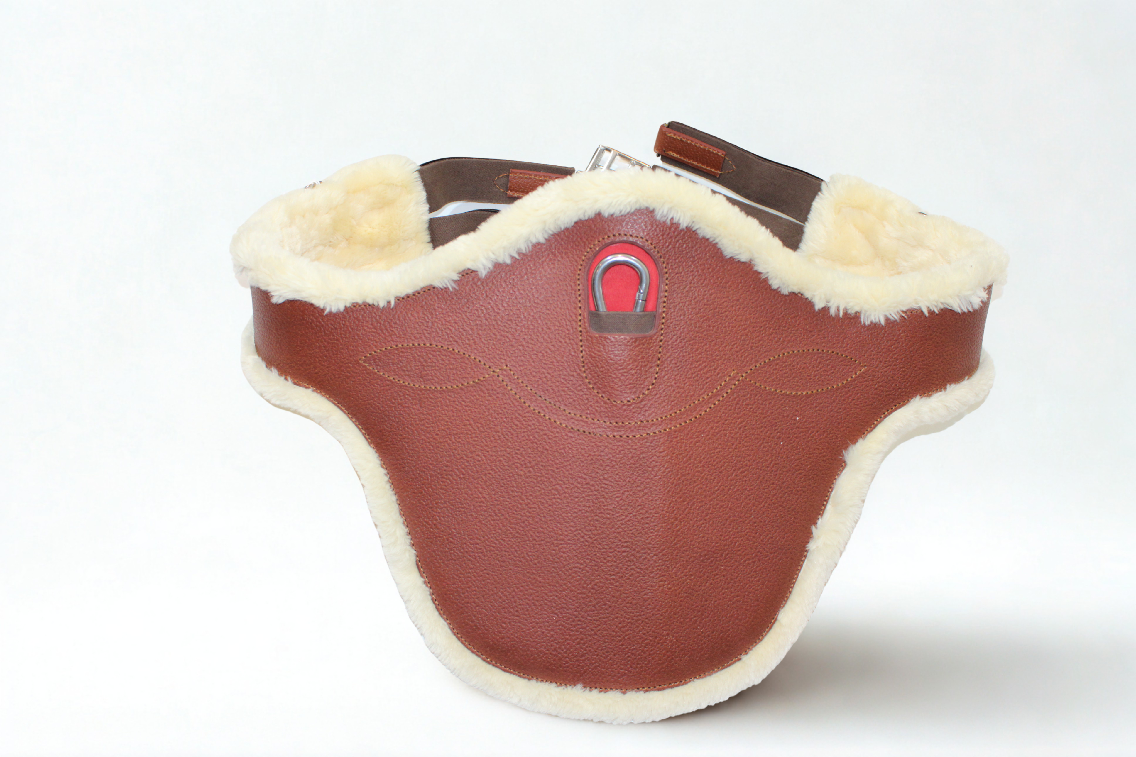 Brown leather Meyer stud girth with natural sheepskin lining, centre carabiner with red accent, and fancy stitch detail against a white background