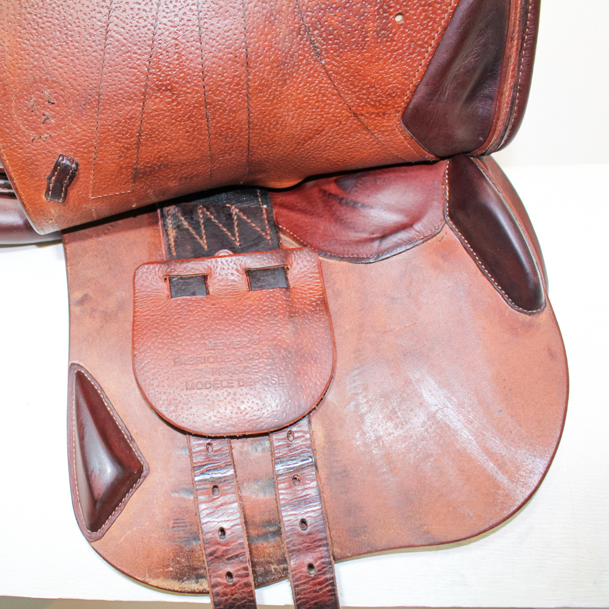 Right side profile view of Meyer Kids Act 1 dual flap jump saddle with the main flap lifted to see the billets, front blocks, and back blocks.