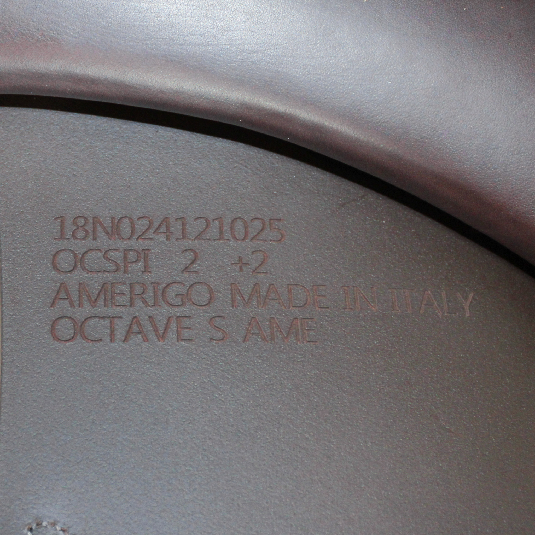 Close up of stamp:
"18N024121025
OCSPI 2 +2
AMERIGO MADE IN ITALY
OCTAVE S AME"