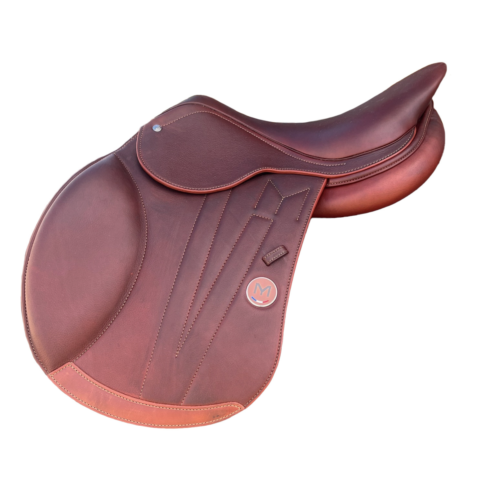 Left side profile view of a Meyer Act 2 jump saddle in brown calf leather, with a hunter brown Meyer logo and decorative stitching on the flap 
