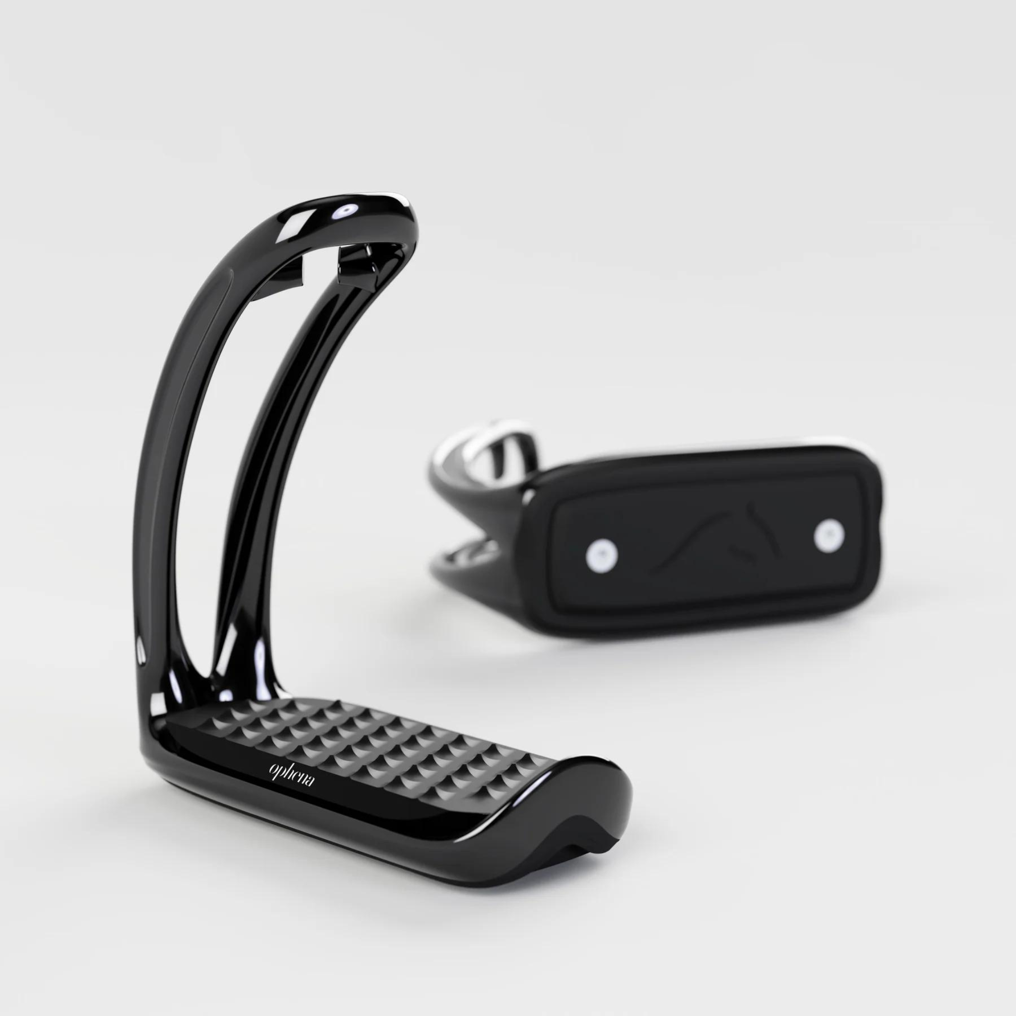 A pair of black Ophena magnetic safety stirrups with a black pro-grip footbed and no outer branch, displayed against a white background.