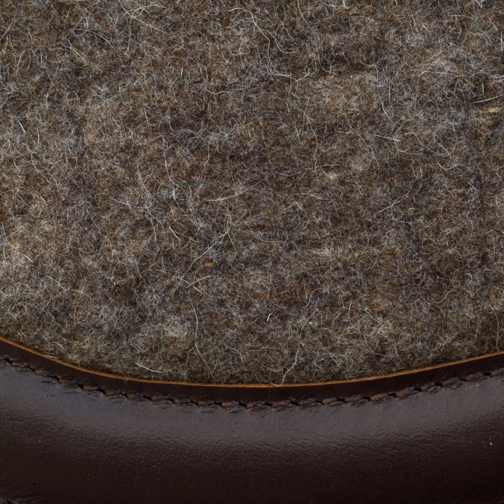 Close-up of brown leather and felt material
