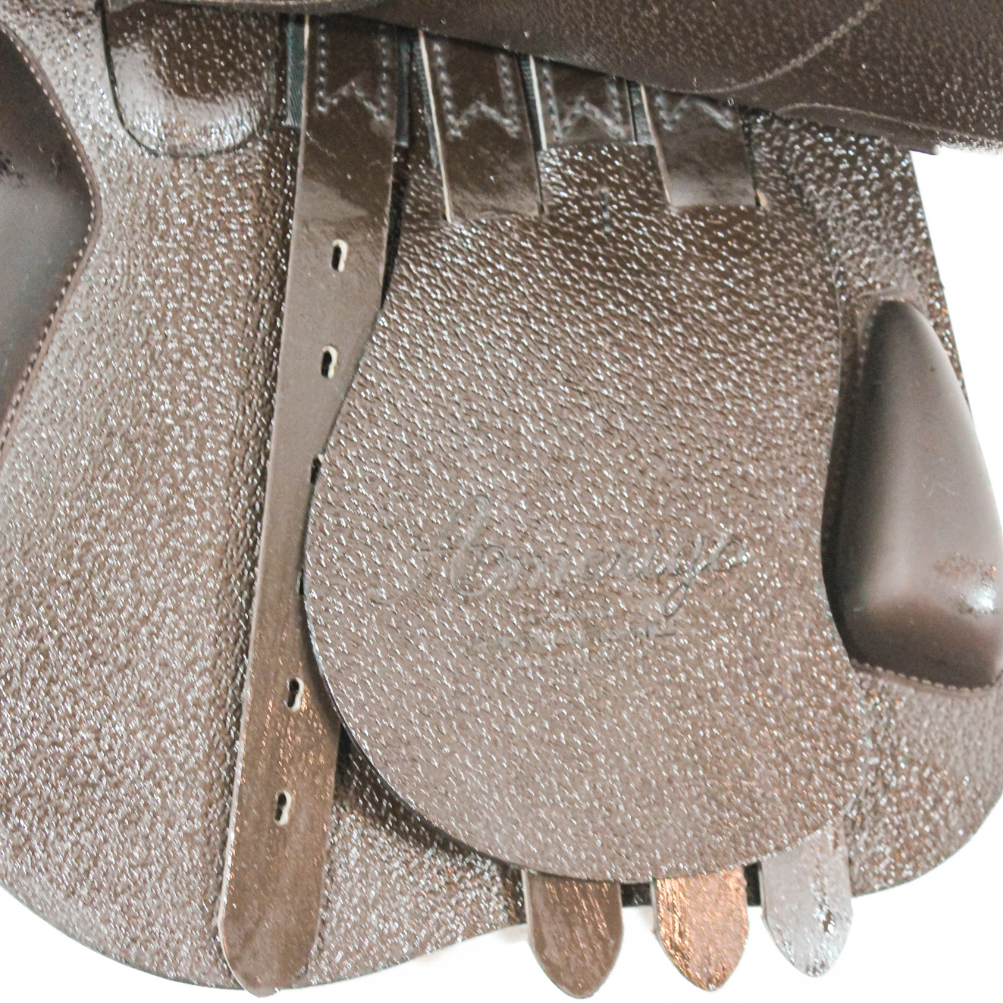 Left side profile view of an Amerigo HC dual flap jump saddle with the main flap lifted to see the billets, front blocks, and back blocks.