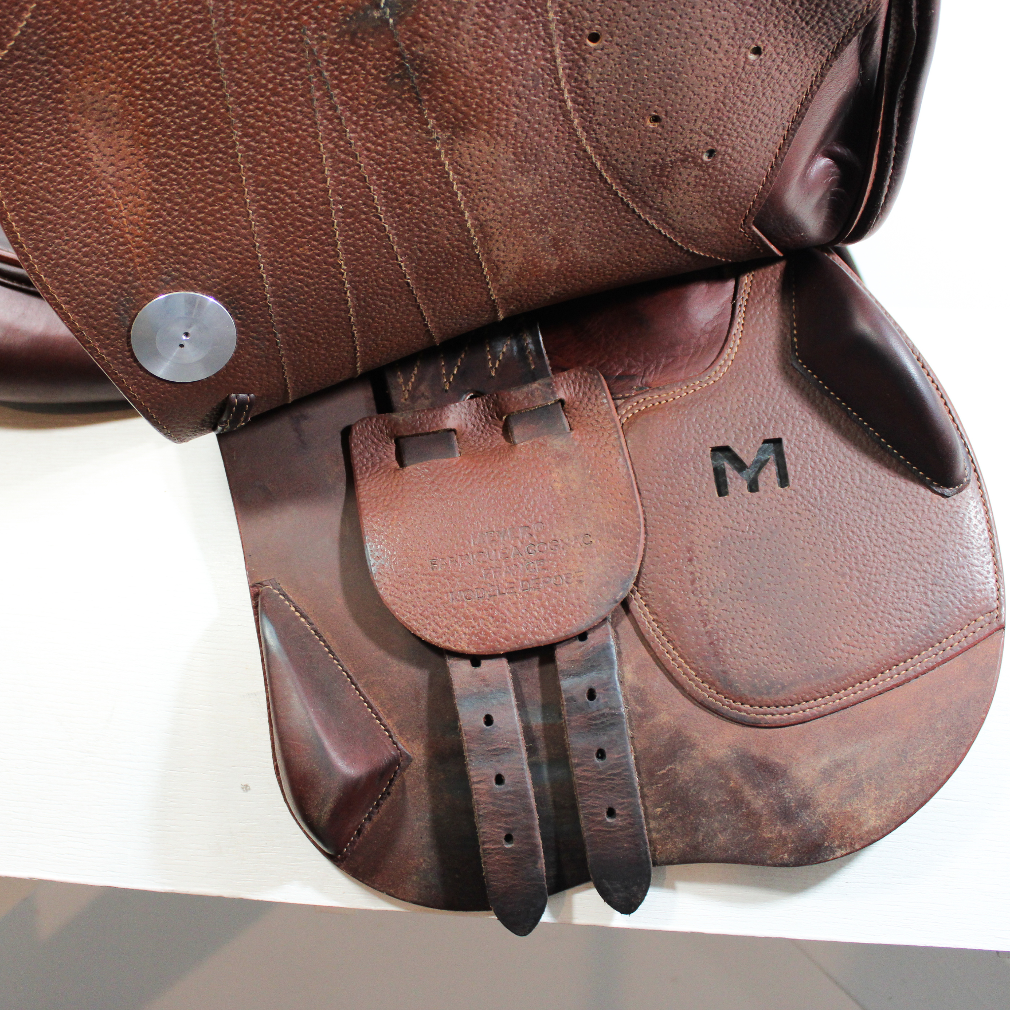 Right side profile view of a Meyer Act 2 jump saddle with the main flap lifted to see the billets, front blocks, and back blocks. 