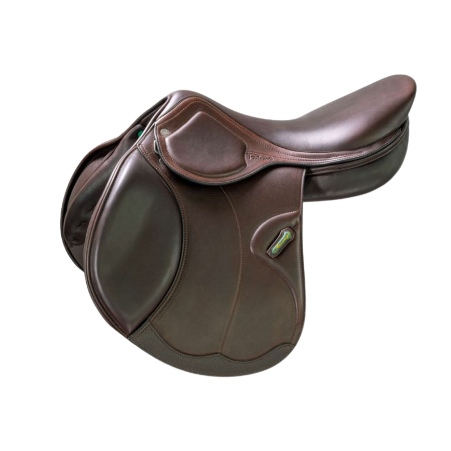 Side view of a dark brown leather Amerigo HC jump saddle with a small green stirrup keeper accent, shown on a plain white background.
