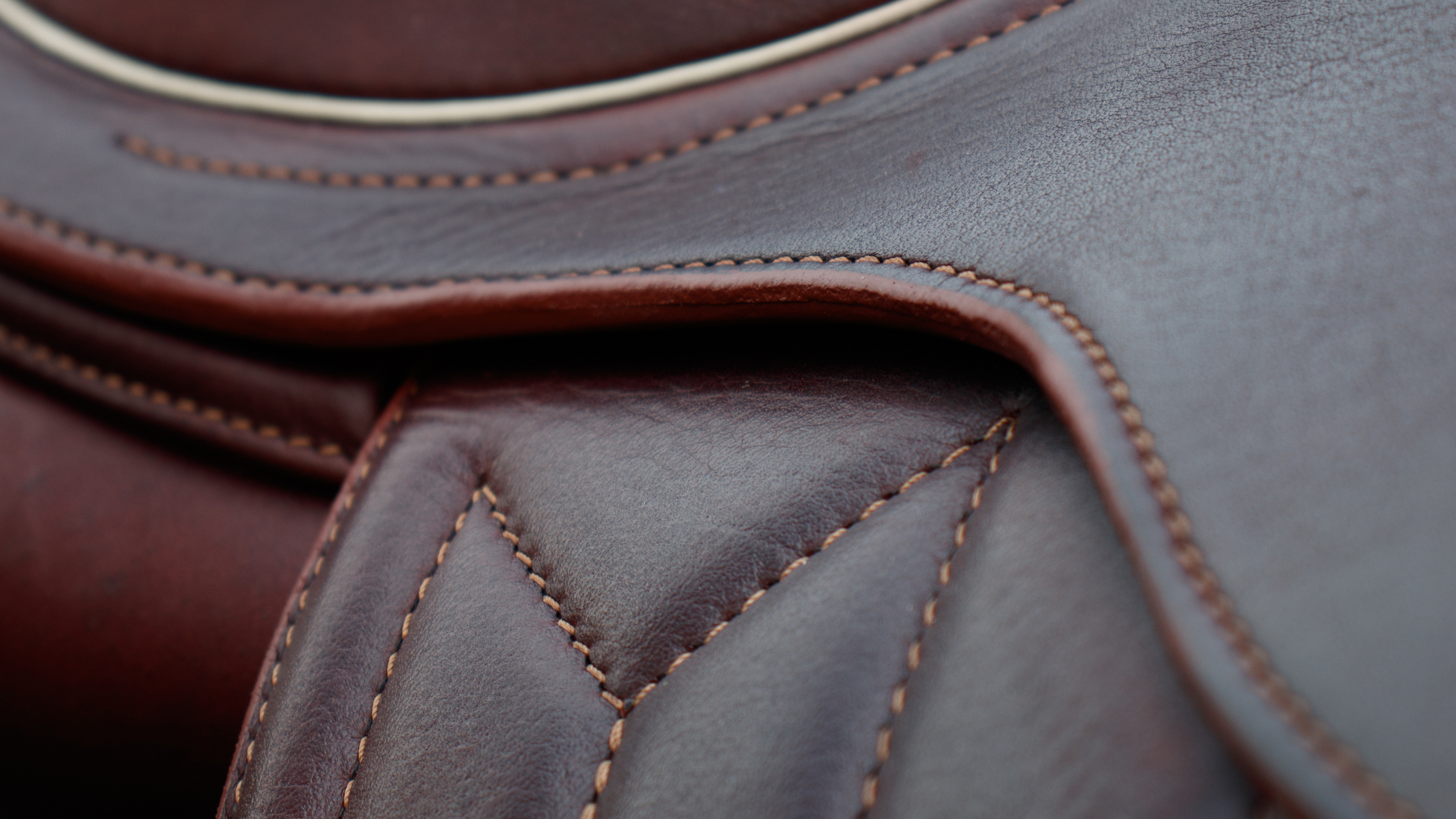 Close up of a Meyer saddle in cognac brown calf leather