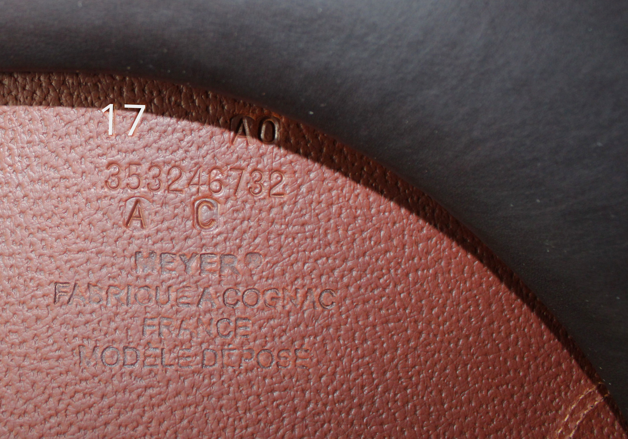 Close up of Meyer stamp with "17" highlighted in white text.