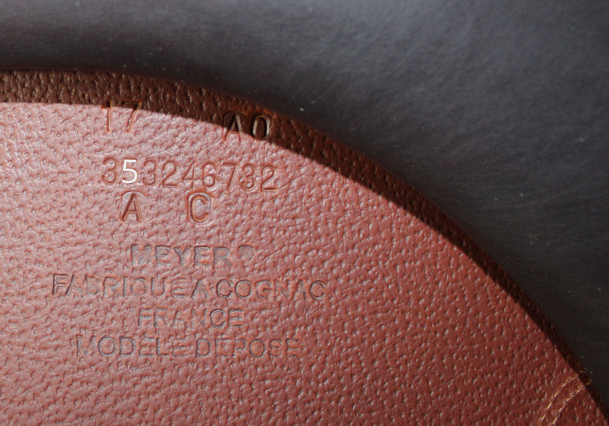 Close up of Meyer stamp with "5" highlighted in white text.